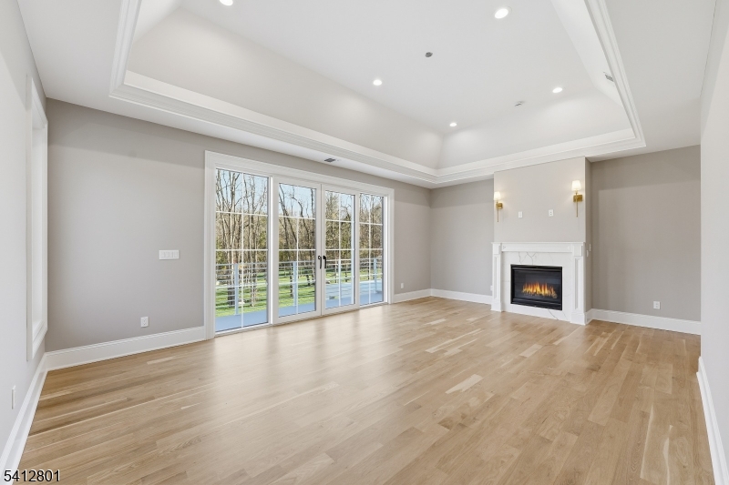 2 Heather Lane Scotch Plains, NJ 07076 - Photo 12 of 17 a view of an empty room with wooden floor and a window