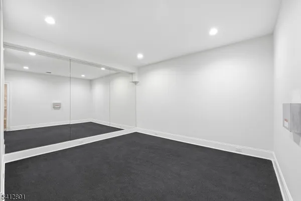 an empty room with a empty space and window