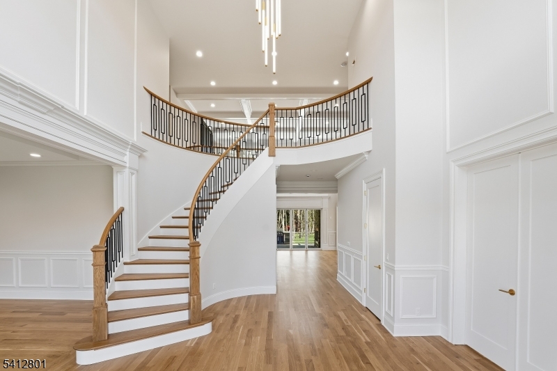 2 Heather Lane Scotch Plains, NJ 07076 - Photo 2 of 17 a view of entryway and hall with wooden floor