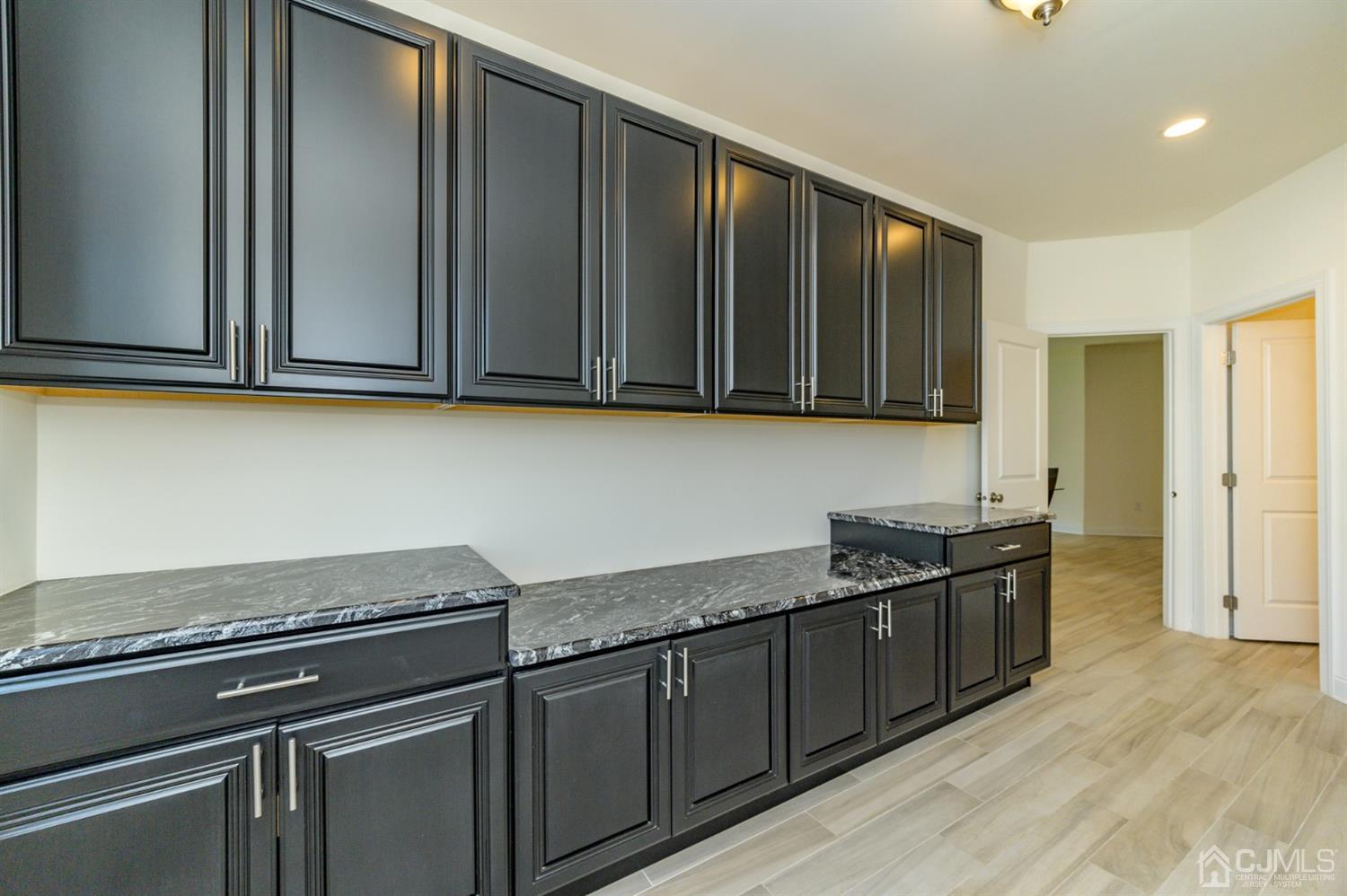 8 Harness Court Cream Ridge, NJ 08514 - Photo 14 of 47 a kitchen with granite countertop a sink cabinets and stainless steel appliances