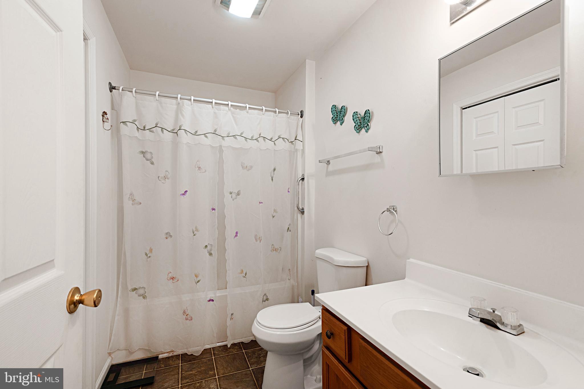 315 Beech Road Millville, NJ 08332 - Photo 12 of 21 a bathroom with a sink toilet and shower