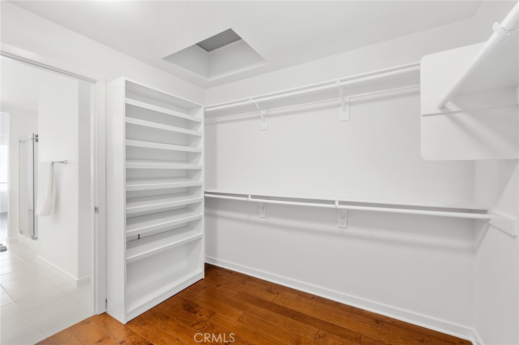 561 Rockefeller Irvine, CA 92612 - Photo 12 of 26 a view of walk in closet with empty racks