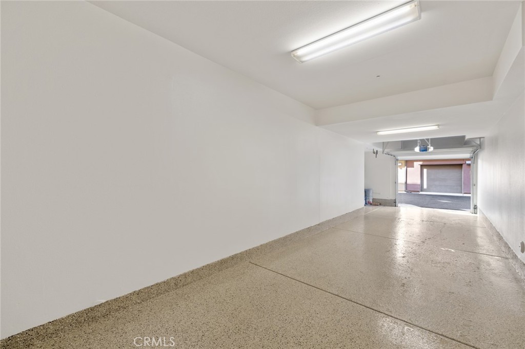 561 Rockefeller Irvine, CA 92612 - Photo 15 of 26 an empty room with windows and fireplace