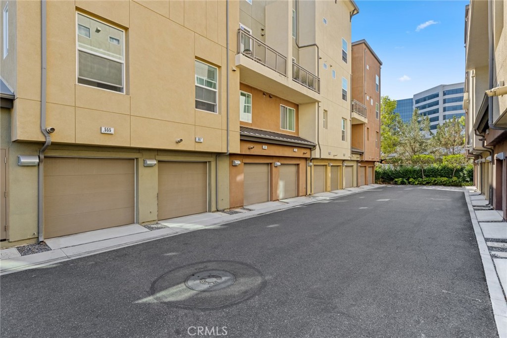 561 Rockefeller Irvine, CA 92612 - Photo 16 of 26 a view of a street with an empty space