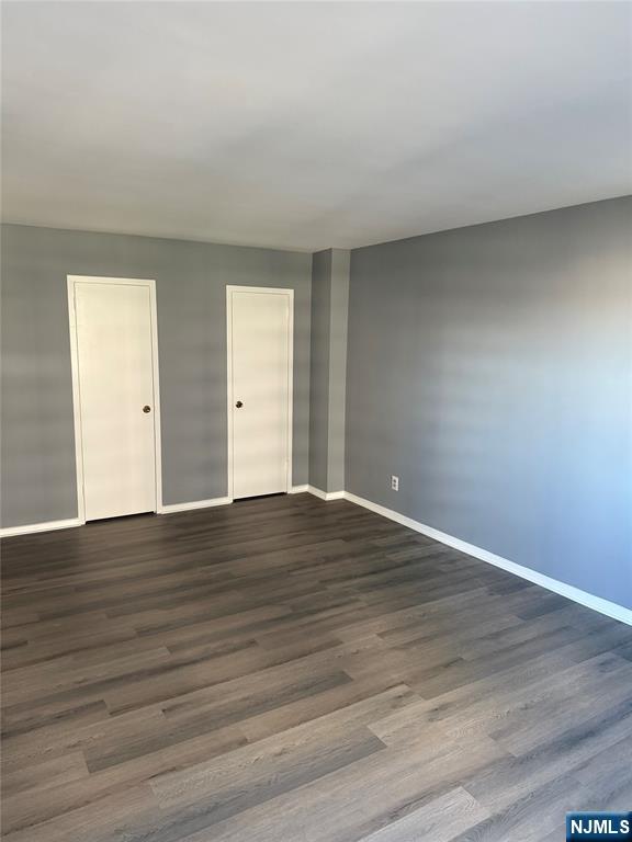 280 South Prospect Avenue, Unit 3N Hackensack, NJ 07601 - Photo 12 of 24 a view of an empty room and wooden floor