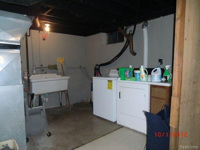 9480 Alpine Road Goodells, MI 48027 - Photo 16 of 16 laundry area in basement.JPG