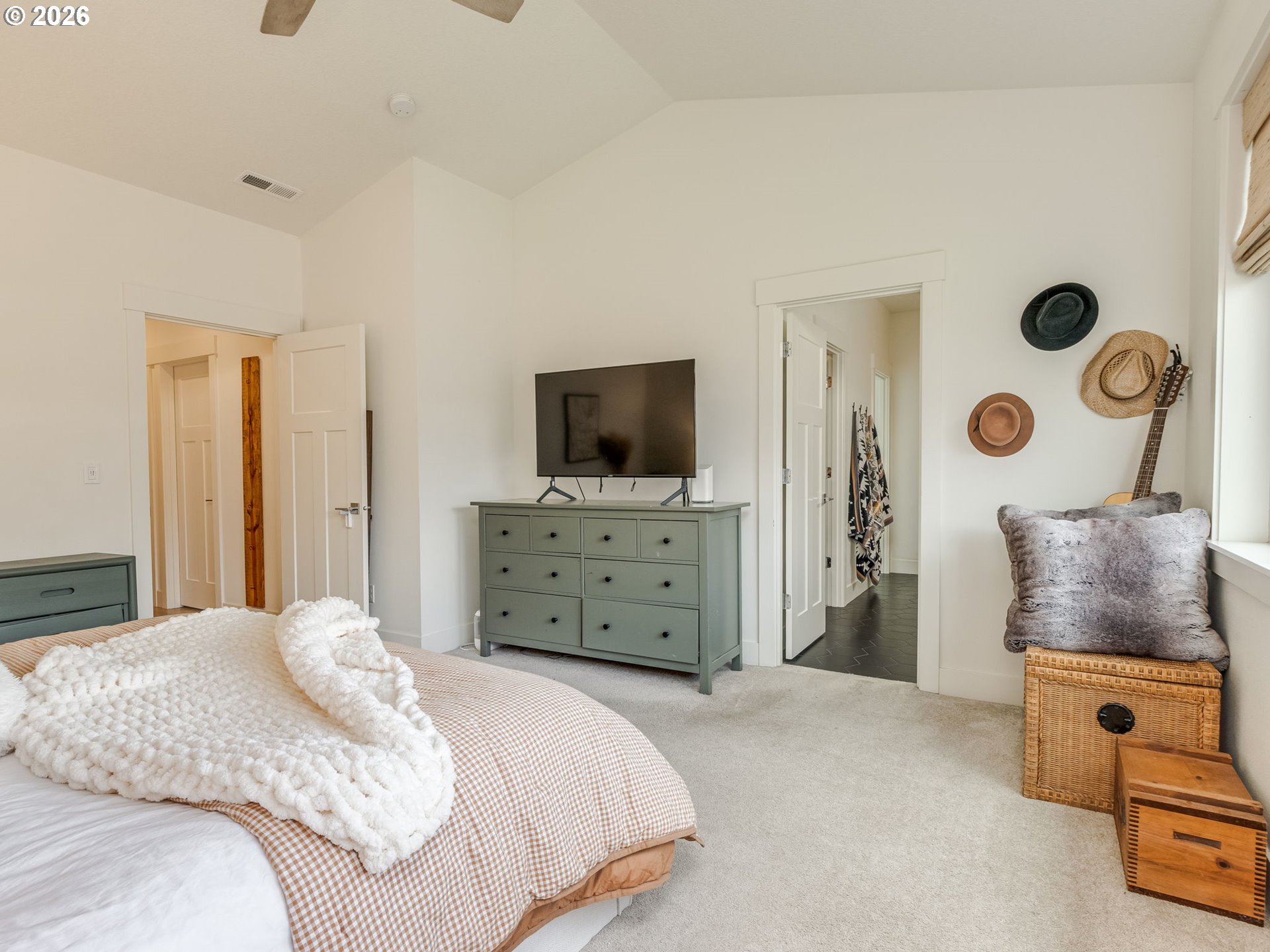 2893 4th Street Hubbard, OR 97032 - Photo 20 of 41 a bedroom with a bed and a television