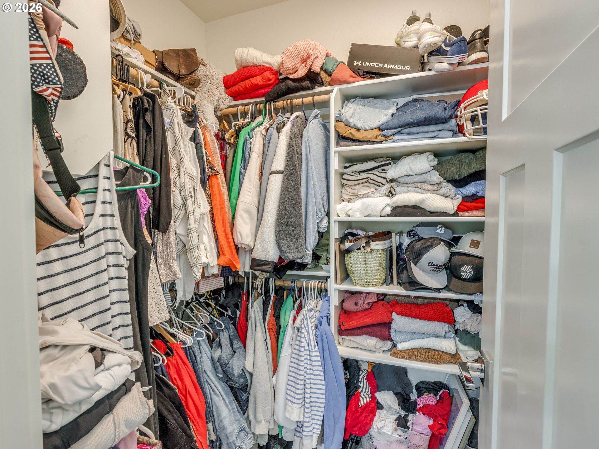 2893 4th Street Hubbard, OR 97032 - Photo 22 of 41 a view of walk in closet with clothes