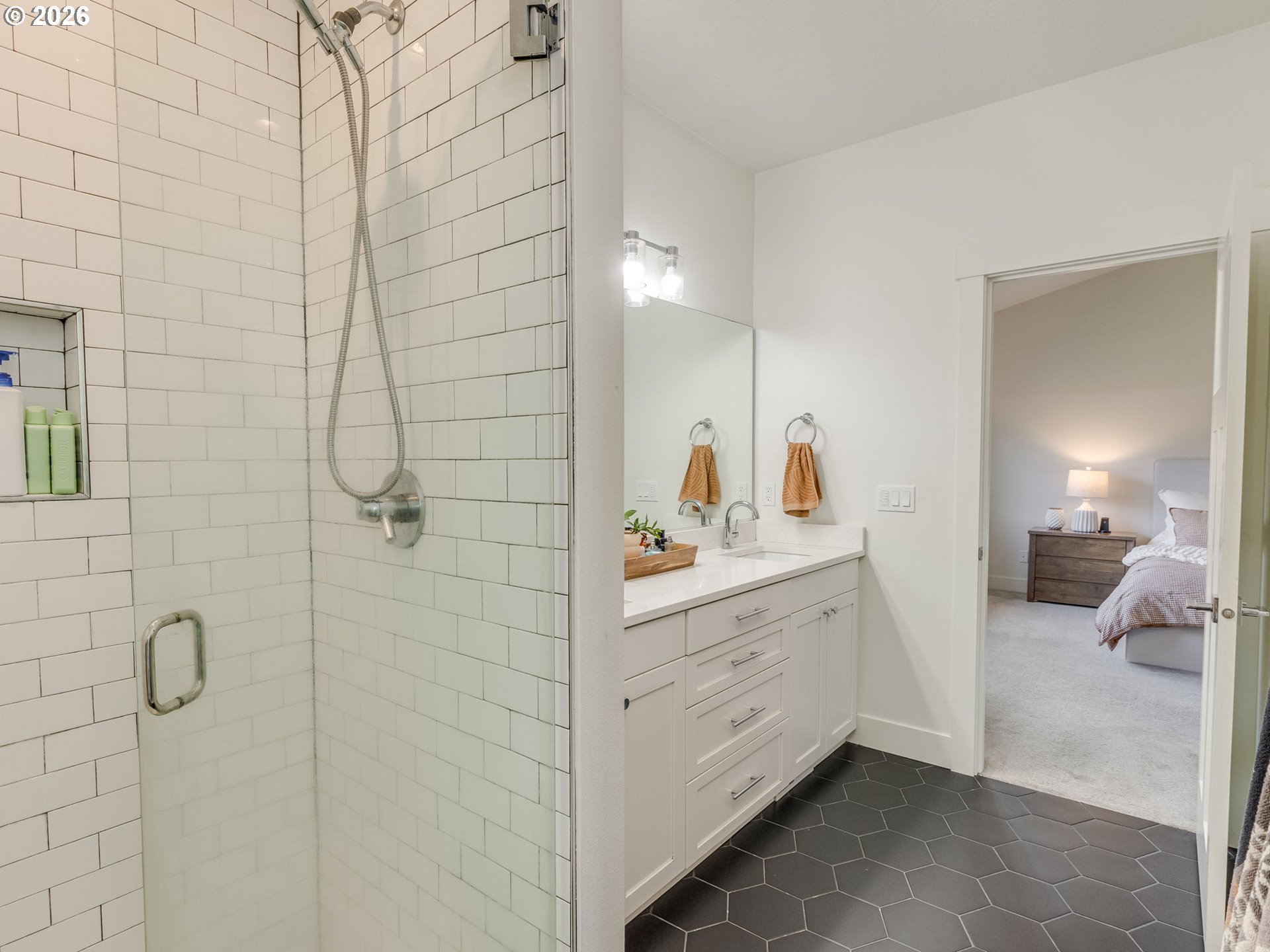 2893 4th Street Hubbard, OR 97032 - Photo 24 of 41 a bathroom with a sink and mirror