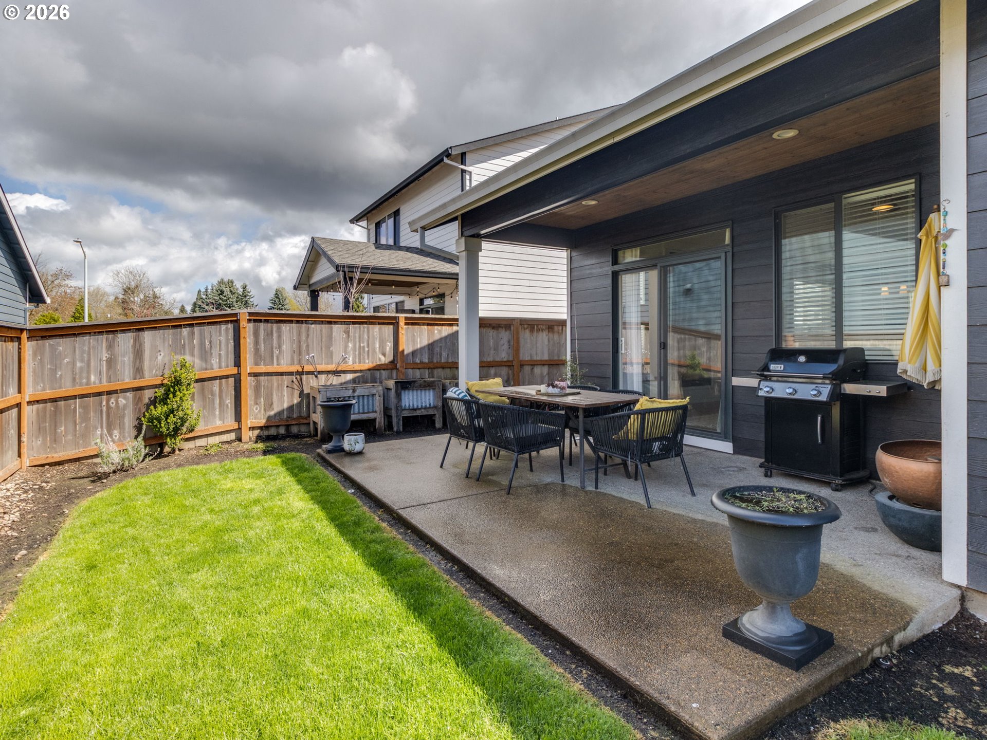 2893 4th Street Hubbard, OR 97032 - Photo 29 of 41 a view of a swimming pool with outdoor seating