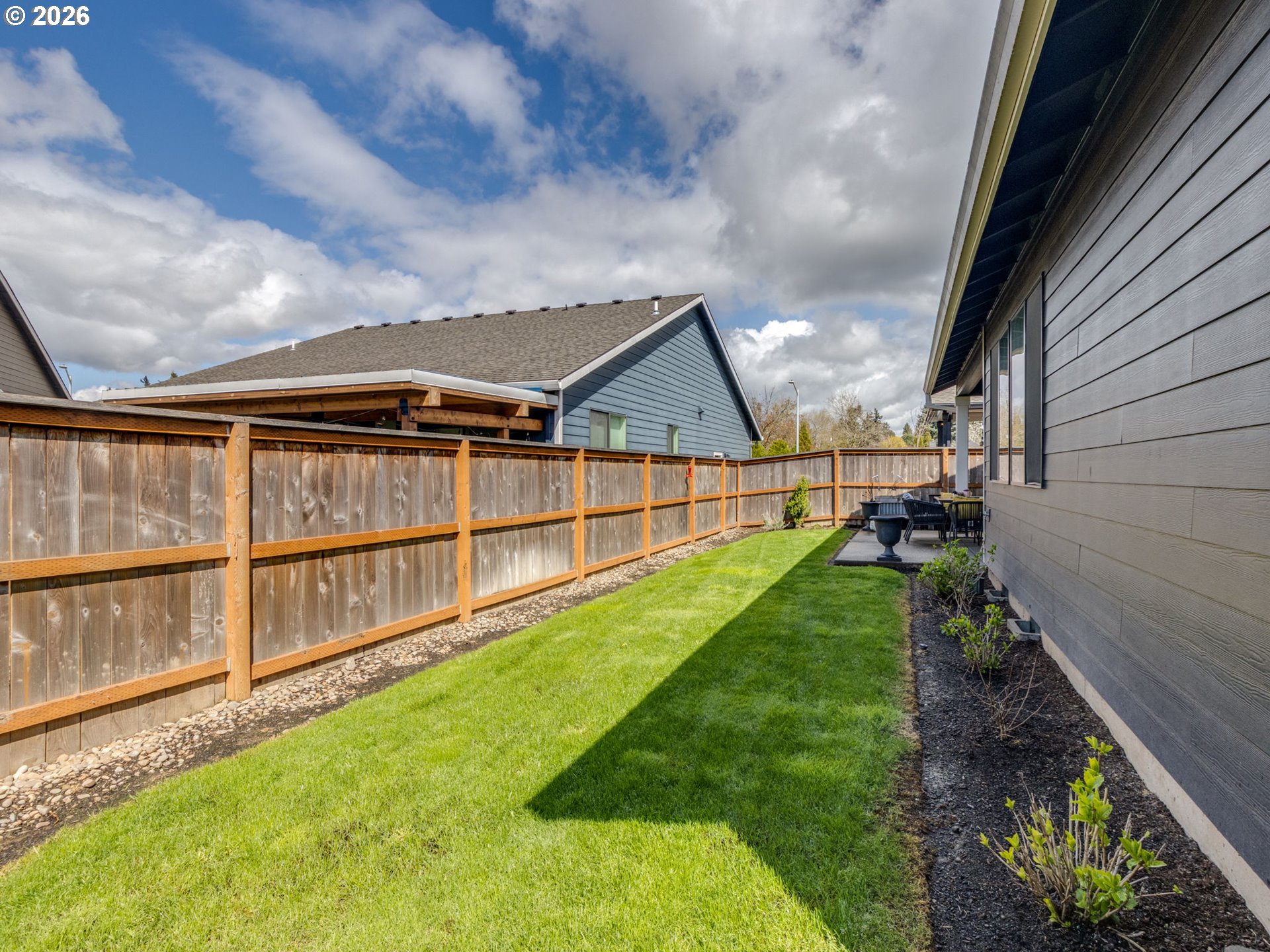 2893 4th Street Hubbard, OR 97032 - Photo 31 of 41 a view of an house with backyard and balcony