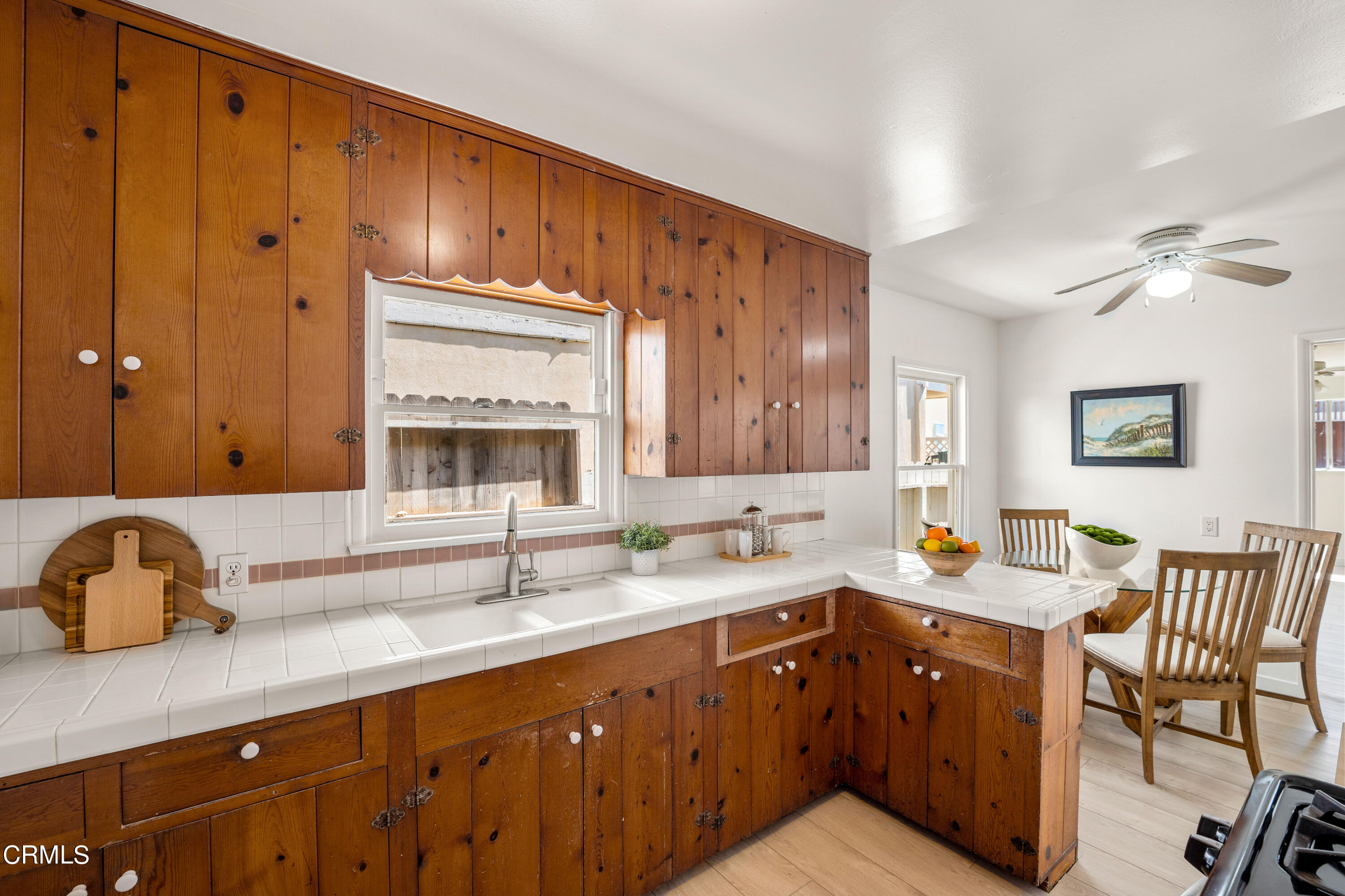 3652 Ocean Drive Oxnard, CA 93035 - Photo 13 of 28 a kitchen with a sink cabinets and window