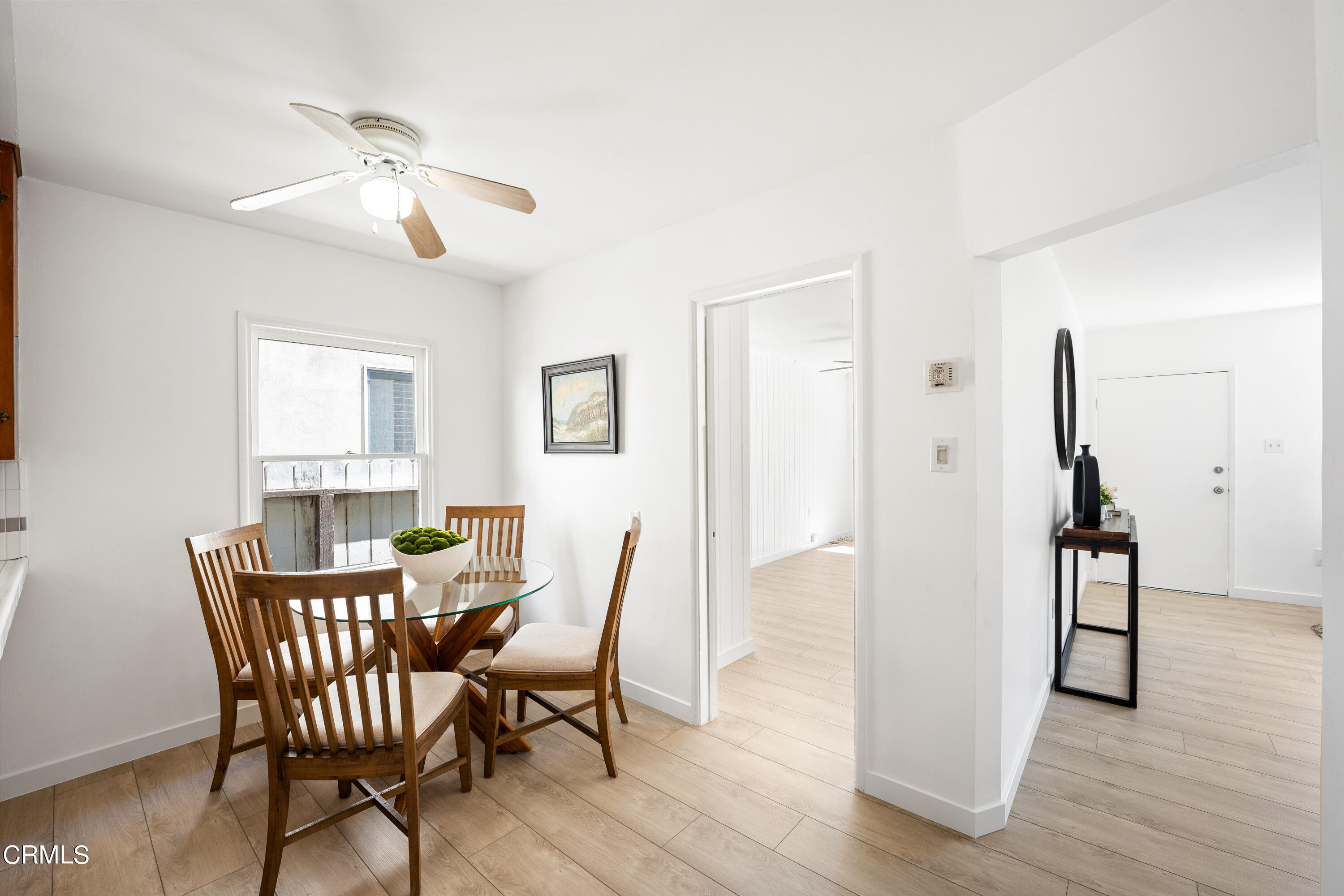 3652 Ocean Drive Oxnard, CA 93035 - Photo 15 of 28 a view of a dining room with furniture and wooden floor