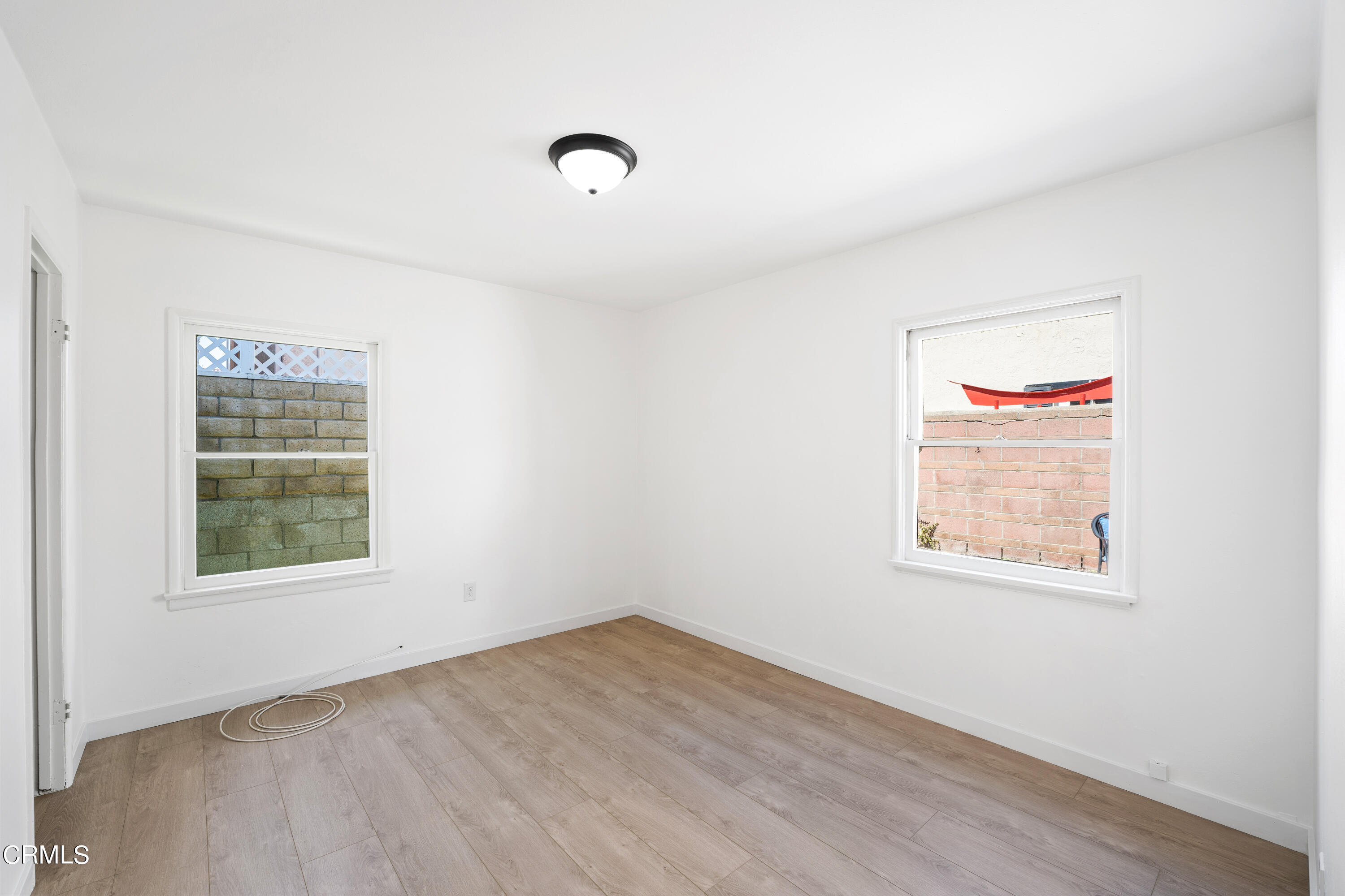 3652 Ocean Drive Oxnard, CA 93035 - Photo 18 of 28 an empty room with a window