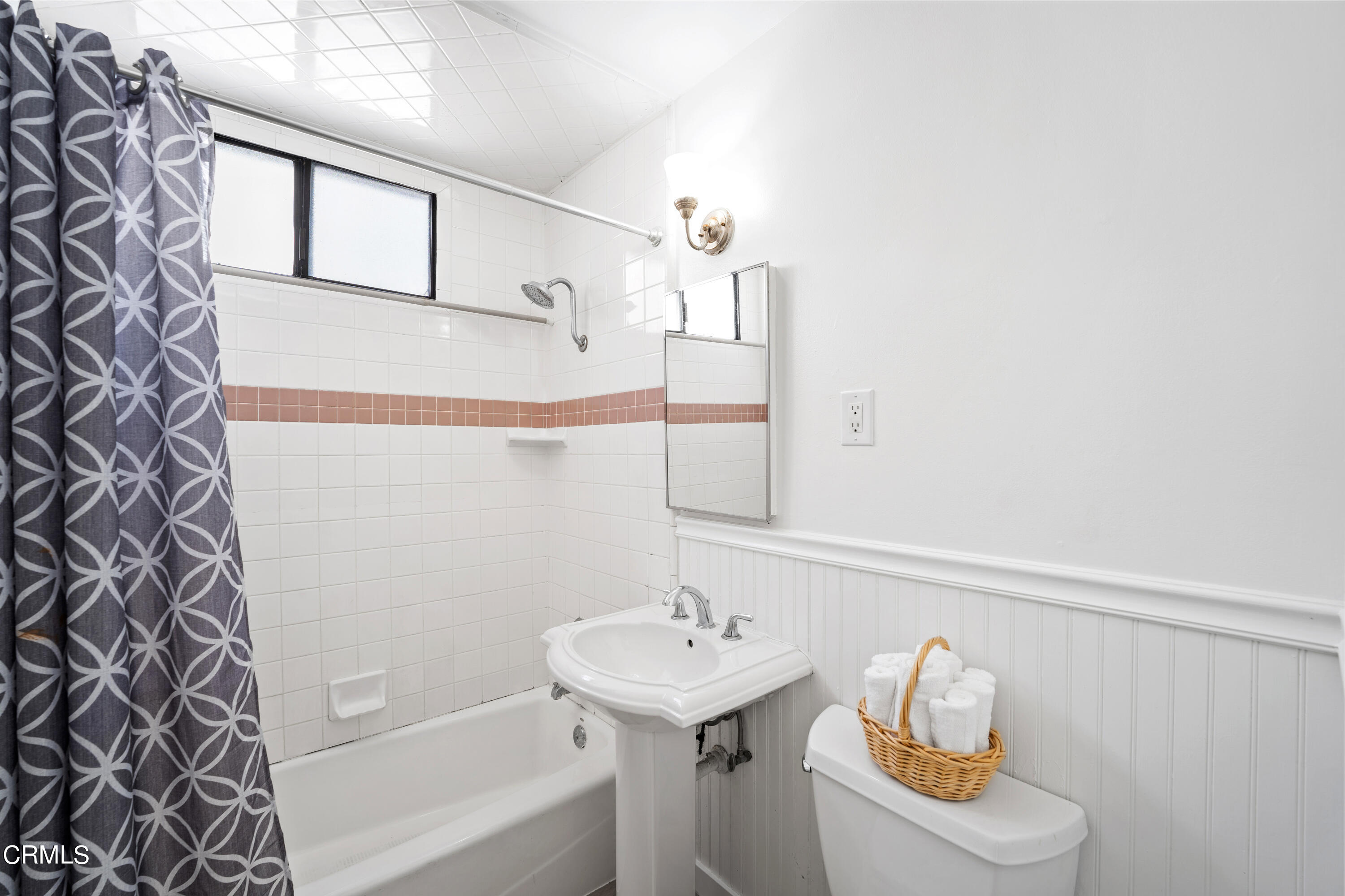 3652 Ocean Drive Oxnard, CA 93035 - Photo 19 of 28 a bathroom with a sink a toilet and bathtub