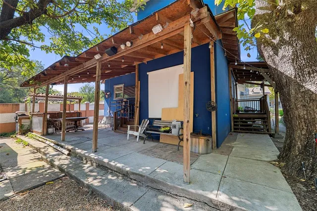 a view of a chairs and tables in patio