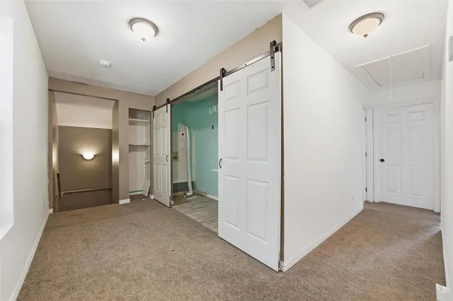 a view of a livingroom with a storage & utility room