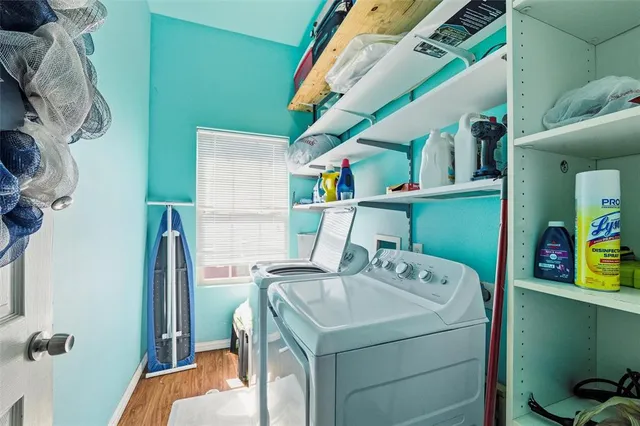 a utility room with dryer and washer