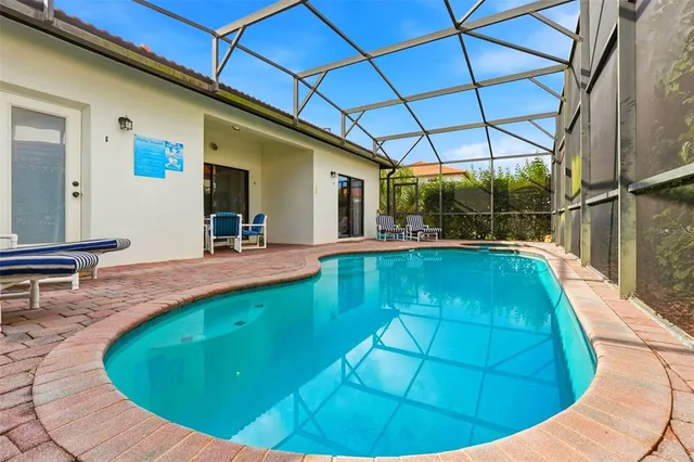a view of a balcony with yard