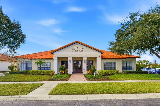 a view of a swimming pool with an outdoor seating