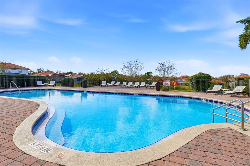16602 Lazy Breeze Loop Clermont, FL 34714 - Photo 44 of 51 a view of a swimming pool with an outdoor seating