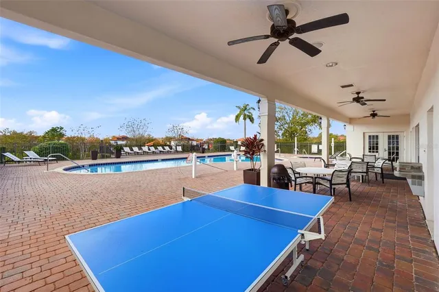 a view of roof deck with patio