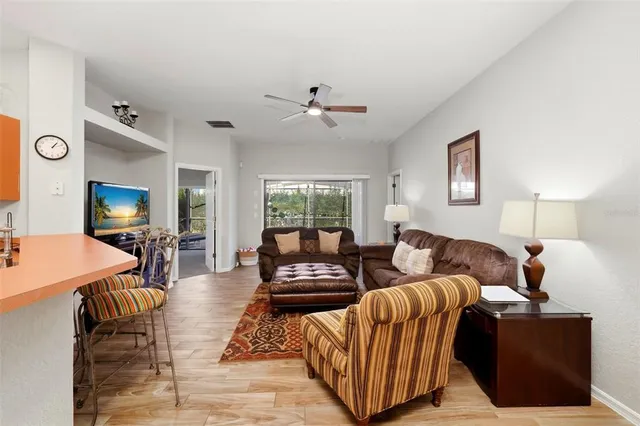 a living room with furniture and a window