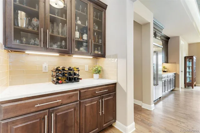 a view of a kitchen from a hallway