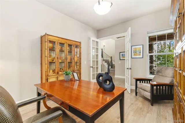 a view of a living room and dining room