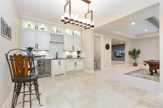 a view of a kitchen and dining room