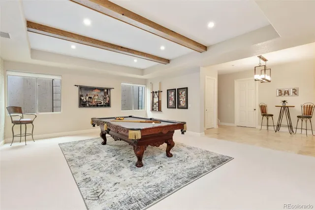 a living room with furniture and a table