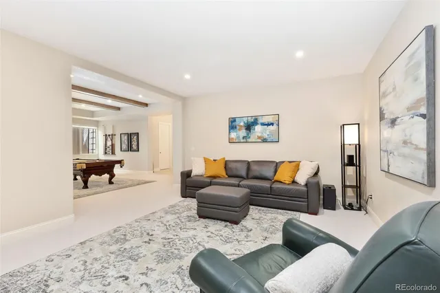 a living room with furniture and a couch