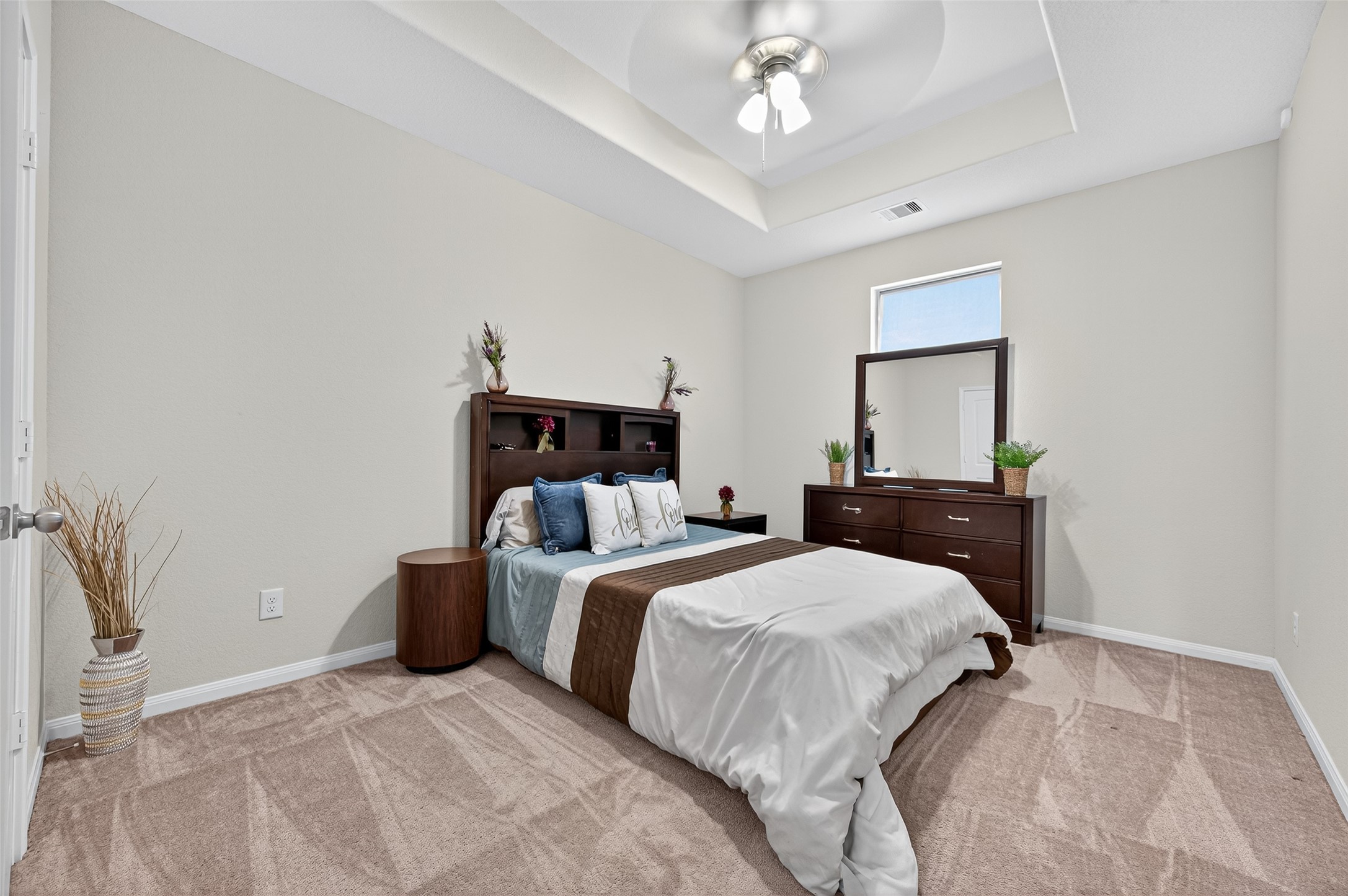 8007 Lehman Road Beasley, TX 77417 - Photo 25 of 47 a bedroom with a bed and a chandelier