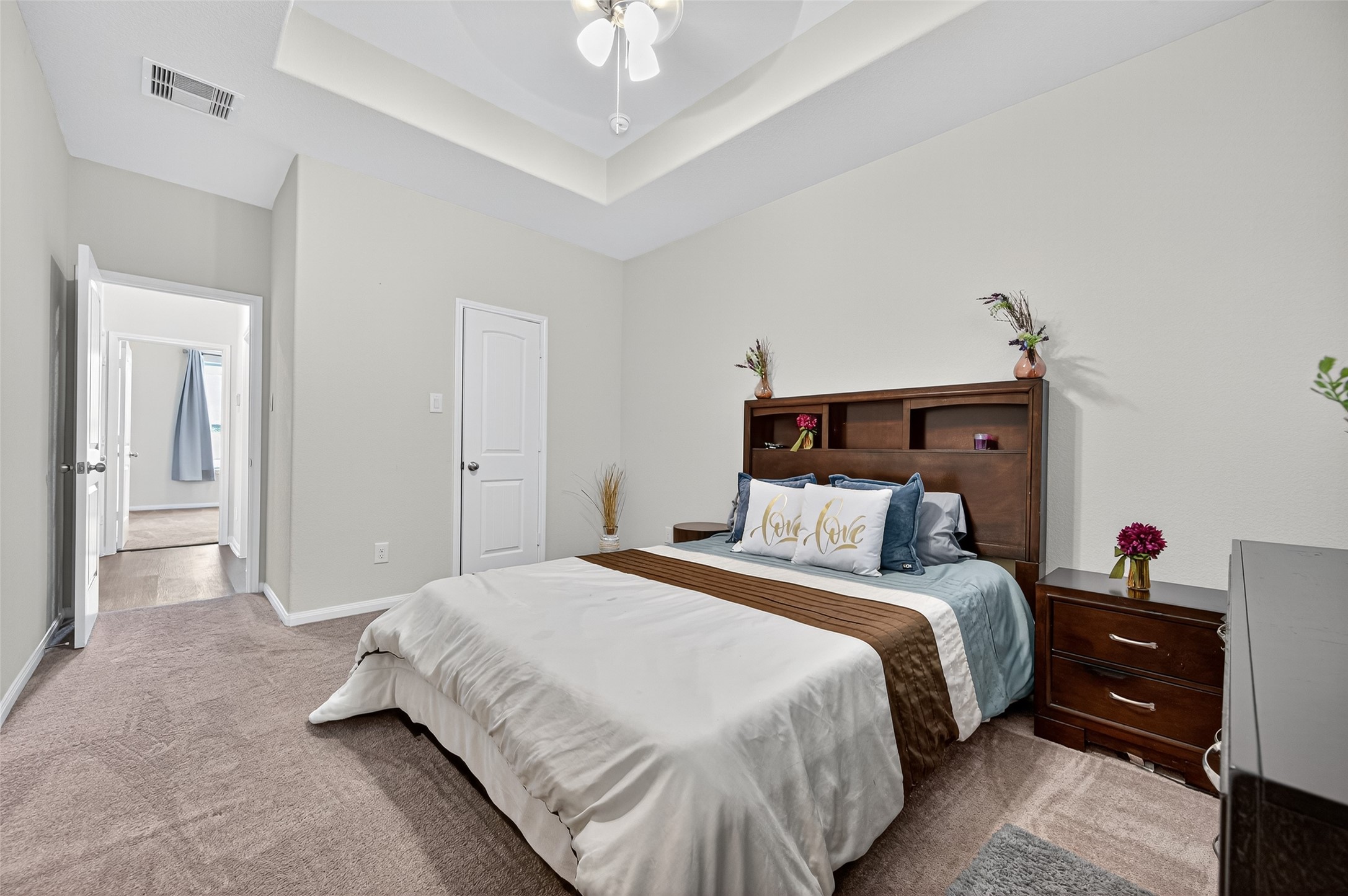 8007 Lehman Road Beasley, TX 77417 - Photo 26 of 47 a bedroom with a bed and a chandelier