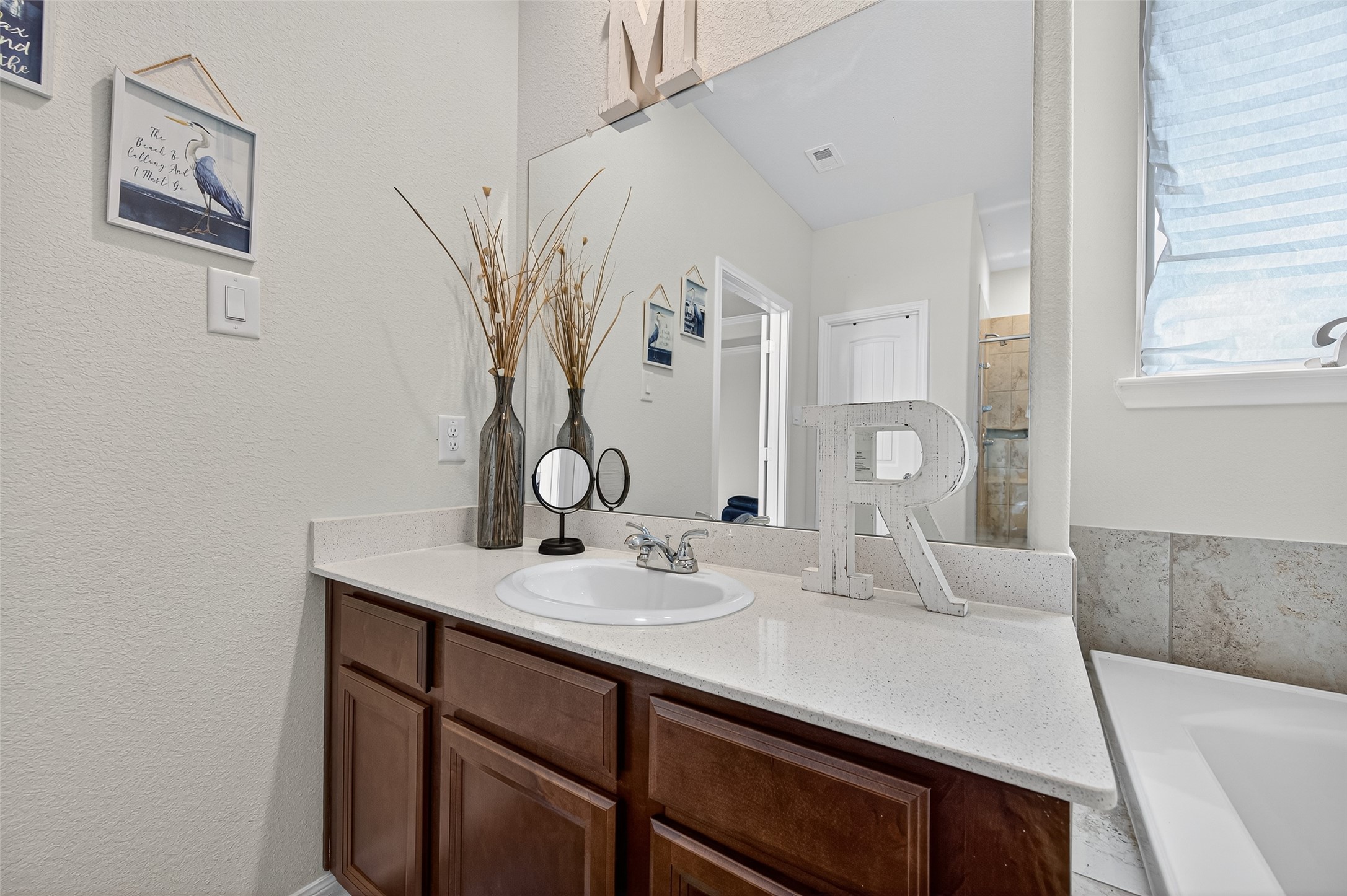 8007 Lehman Road Beasley, TX 77417 - Photo 36 of 47 a bathroom with a sink and a mirror
