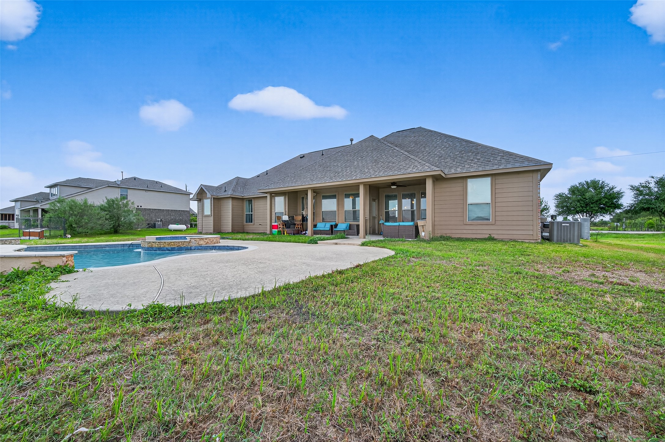 8007 Lehman Road Beasley, TX 77417 - Photo 45 of 47 a front view of a house with a yard and garage