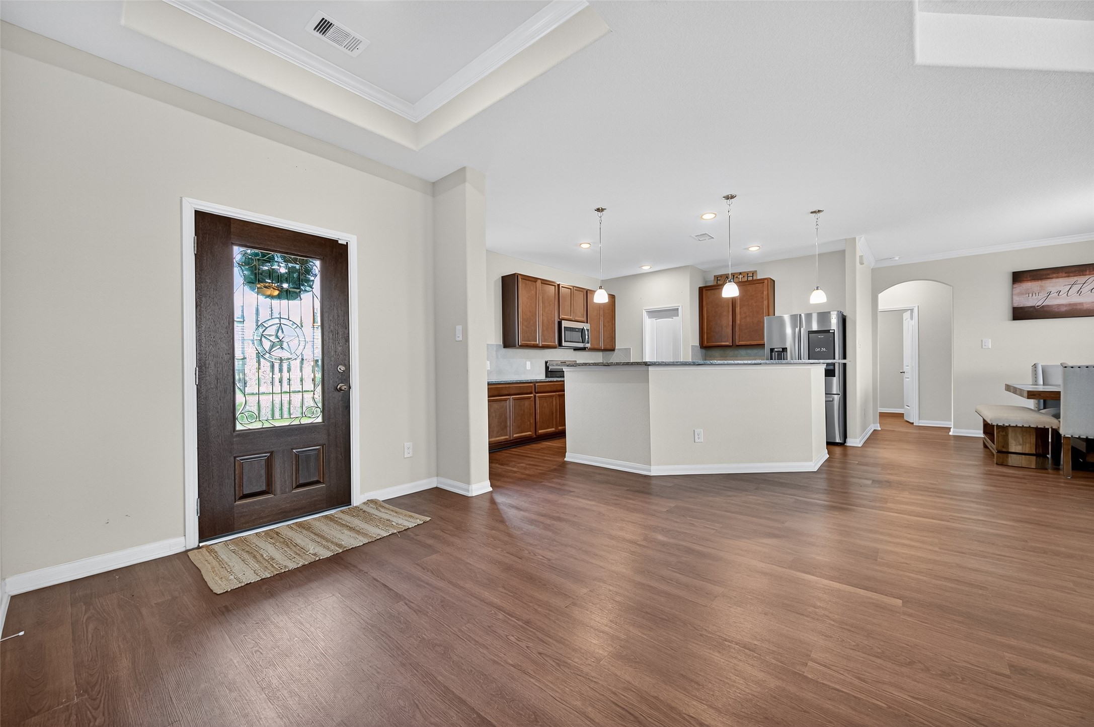 8007 Lehman Road Beasley, TX 77417 - Photo 7 of 47 a view of a kitchen with wooden floor and a sink