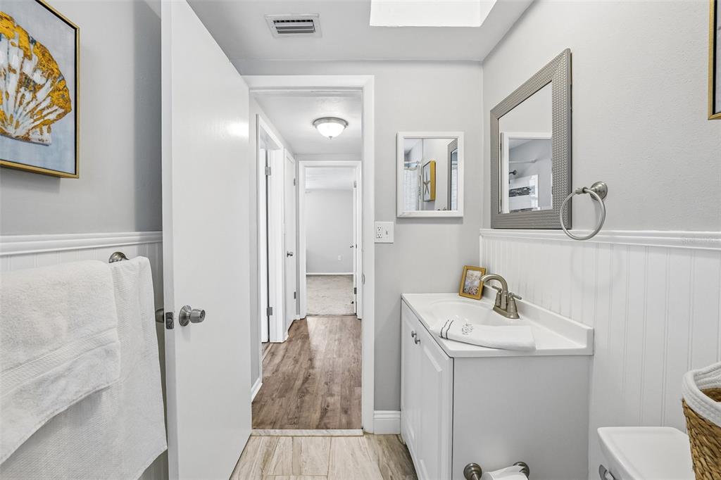 7215 Mayfield Drive Port Richey, FL 34668 - Photo 38 of 52 a bathroom with a sink toilet and shower