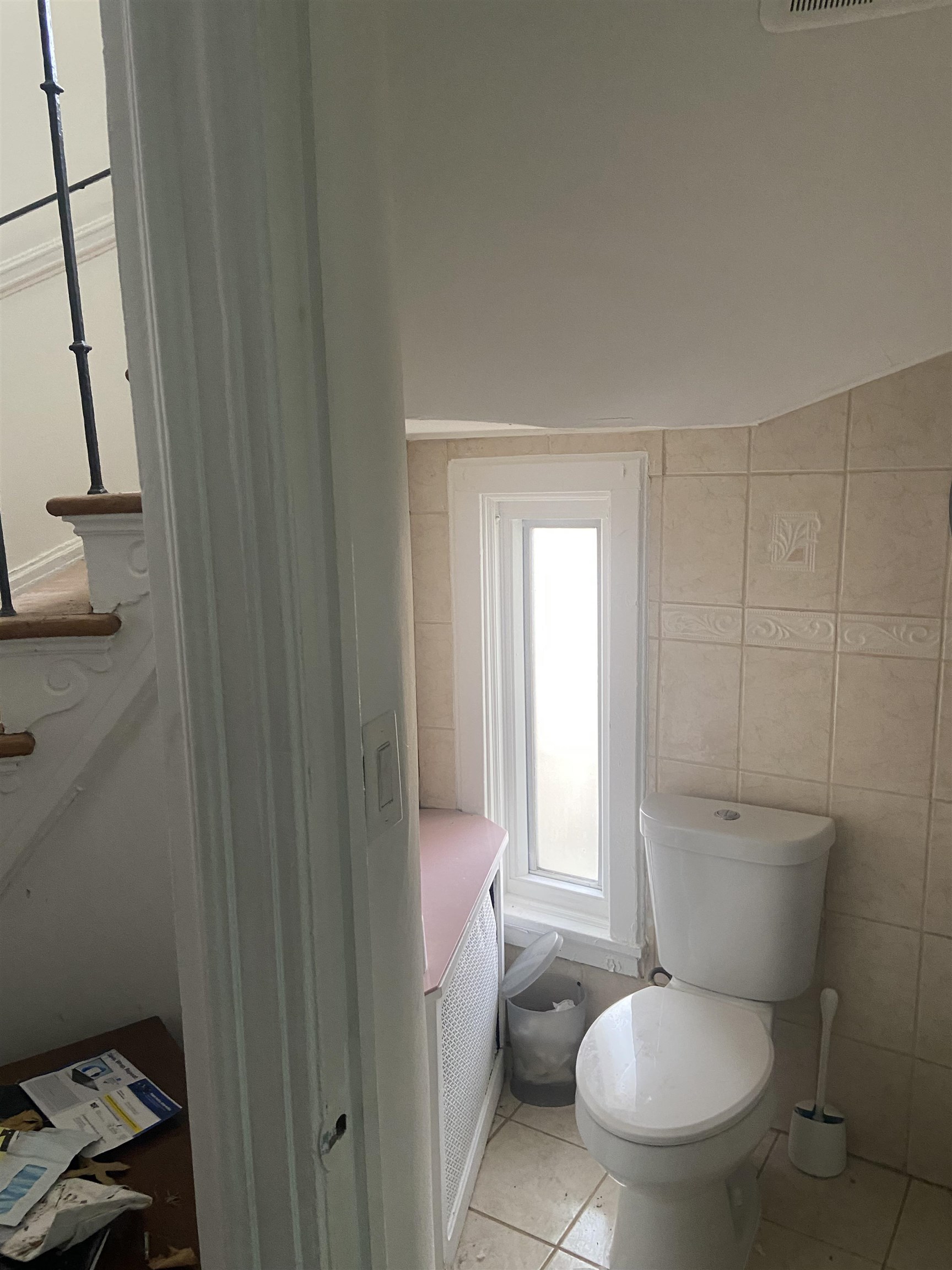 725 Elizabeth Avenue Newark, NJ 07112 - Photo 6 of 7 a white toilet sitting next to a bathroom sink