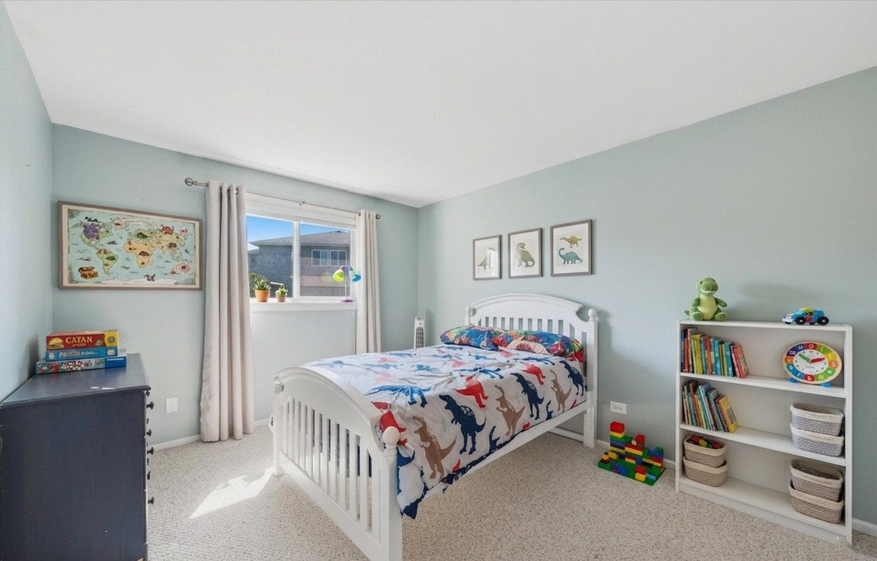 3517 Jacqueline Drive Crete, IL 60417 - Photo 18 of 26 a bedroom with a bed and a window