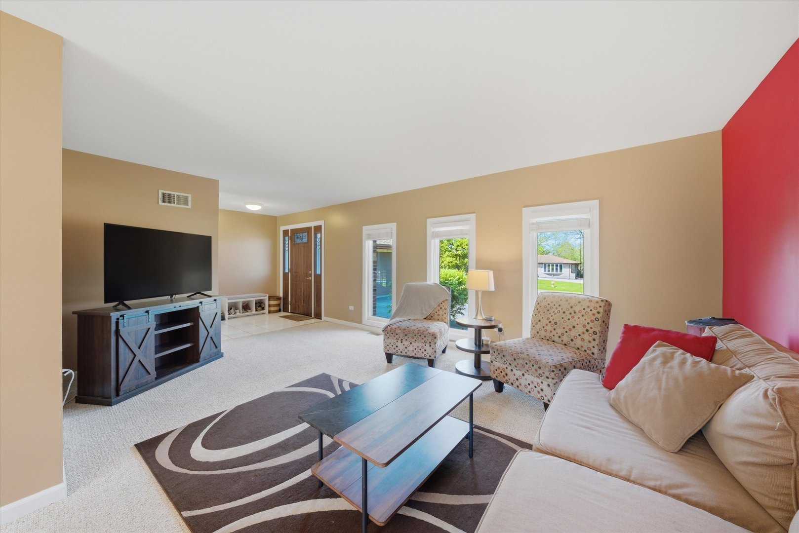 3517 Jacqueline Drive Crete, IL 60417 - Photo 4 of 26 a living room with furniture and a flat screen tv