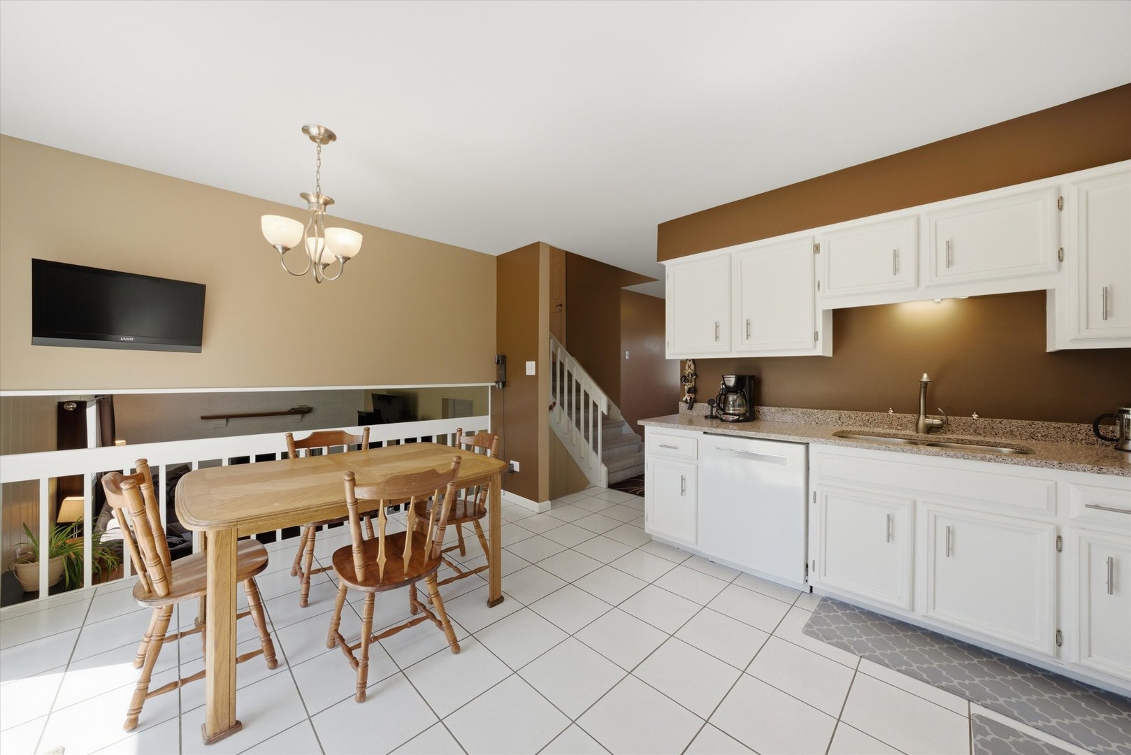 3517 Jacqueline Drive Crete, IL 60417 - Photo 6 of 26 a kitchen with a cabinets and chairs
