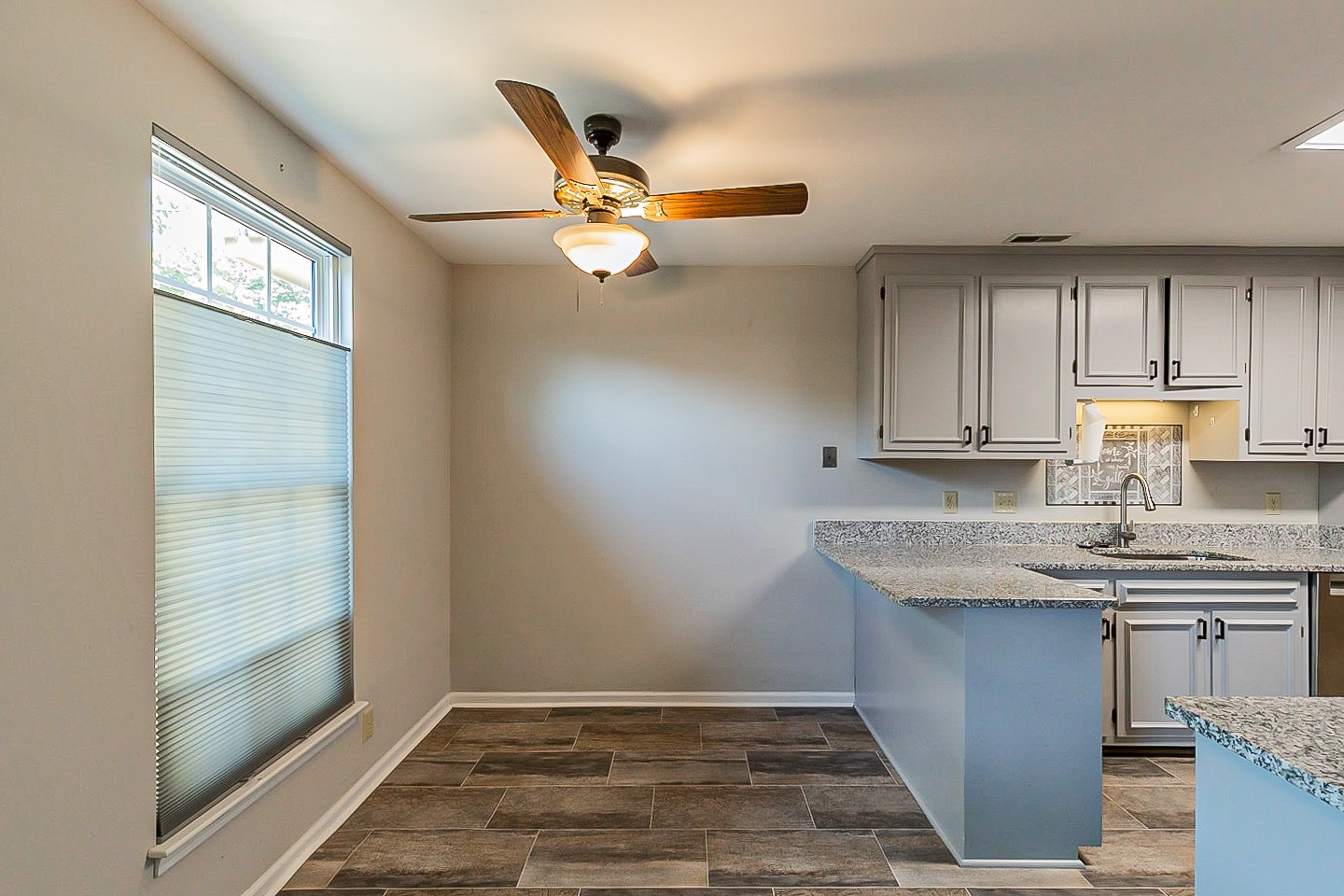 896 General George Patton Road Nashville, TN 37221 - Photo 9 of 23 a view of kitchen with granite countertop cabinets and window