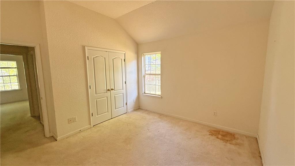 65 Lakeridge Court Covington, GA 30016 - Photo 16 of 17 an empty room with windows