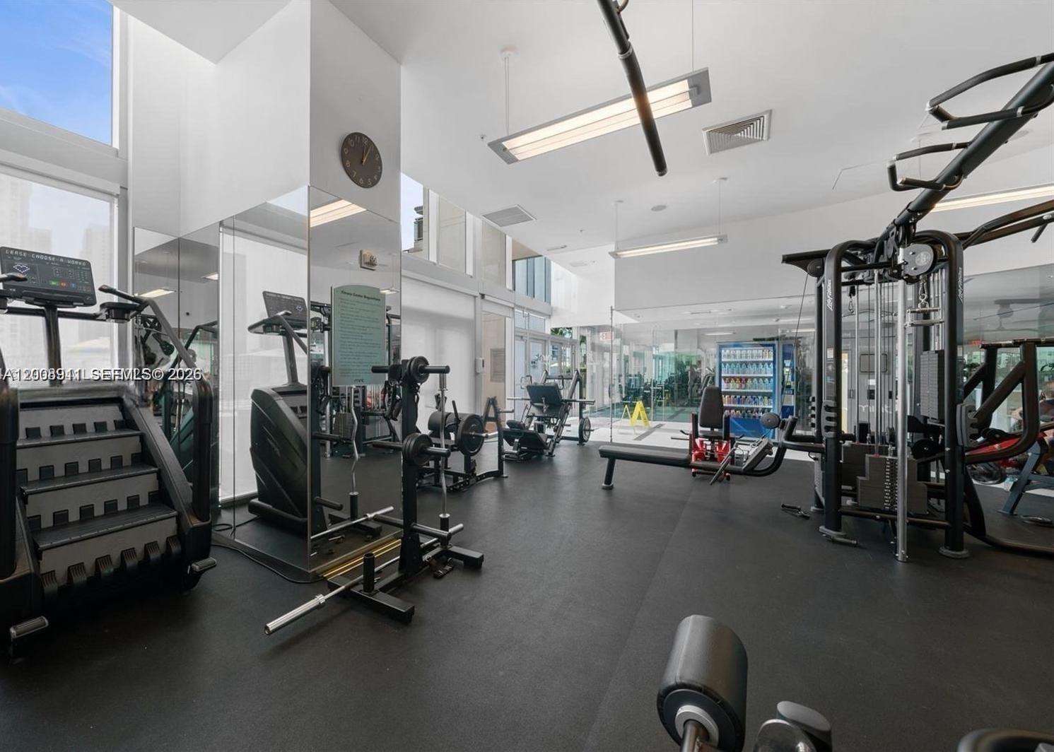 92 Southwest 3rd Street, Unit 2510 Miami, FL 33130 - Photo 24 of 35 a view of a room with gym equipment