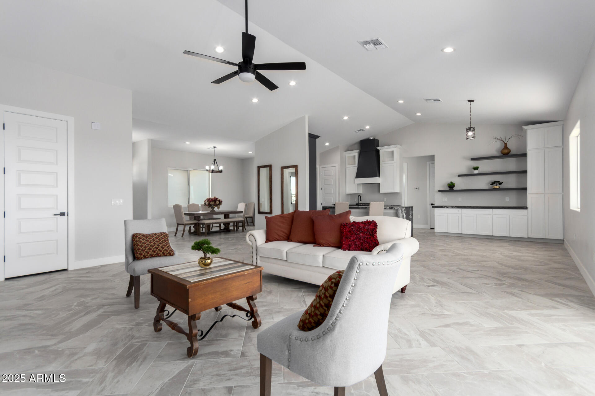 19657 West Dunlap Road Buckeye, AZ 85326 - Photo 12 of 45 a living room with furniture and kitchen view