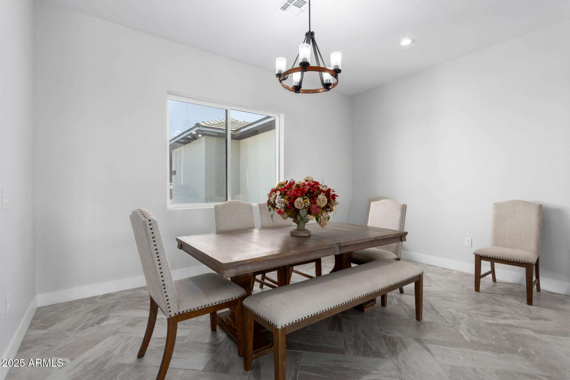 19657 West Dunlap Road Buckeye, AZ 85326 - Photo 22 of 45 a view of a dining room with furniture and wooden floor