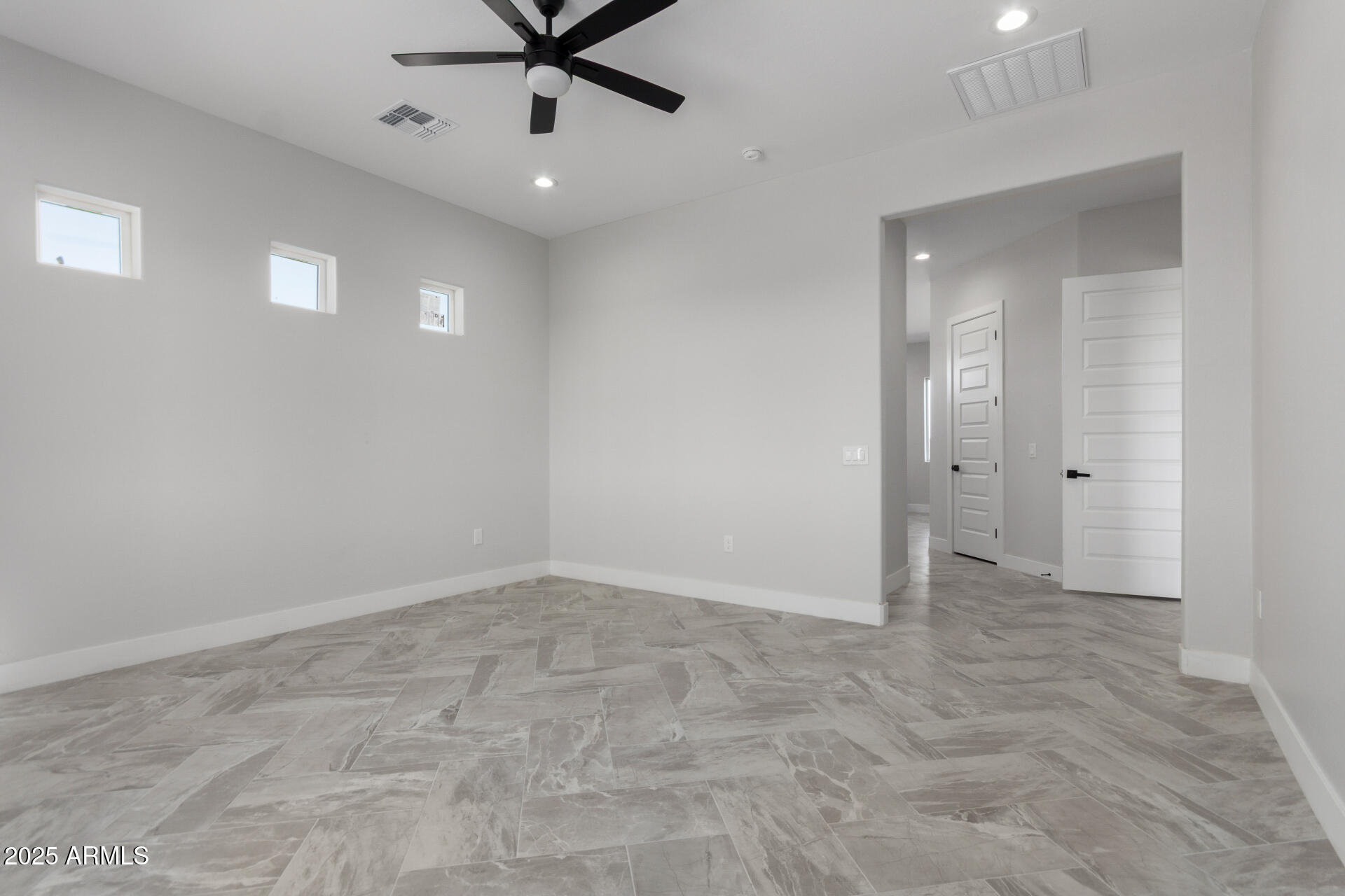 19657 West Dunlap Road Buckeye, AZ 85326 - Photo 25 of 45 wooden floor in an empty room