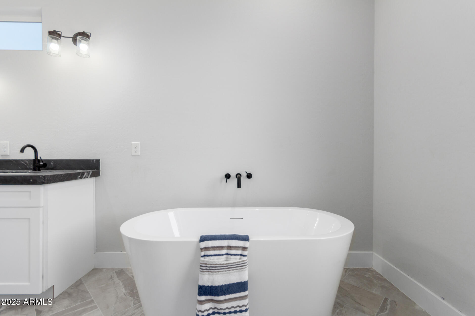 19657 West Dunlap Road Buckeye, AZ 85326 - Photo 31 of 45 a view of a bathtub in a bathroom