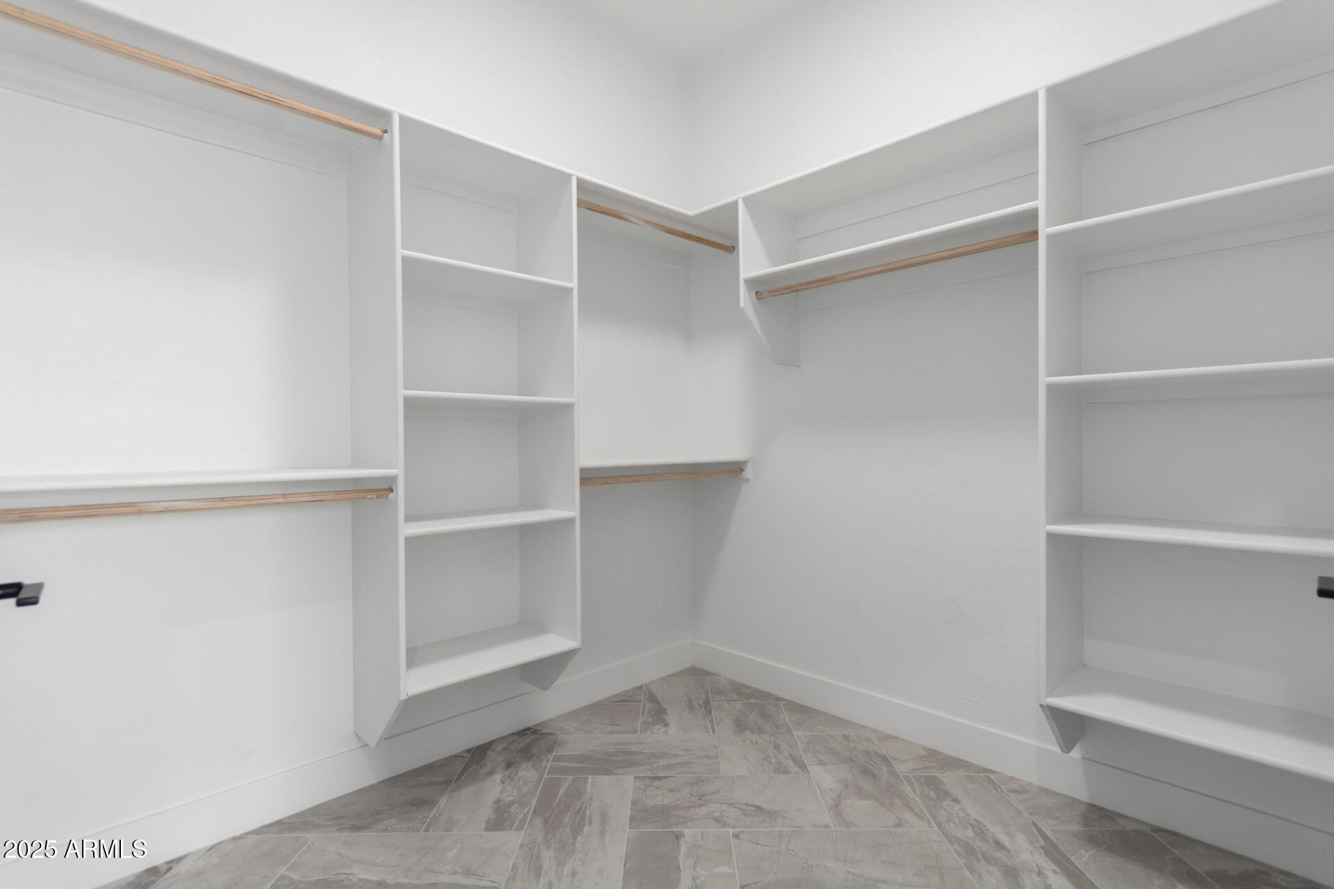 19657 West Dunlap Road Buckeye, AZ 85326 - Photo 32 of 45 a view of an empty walk in closet